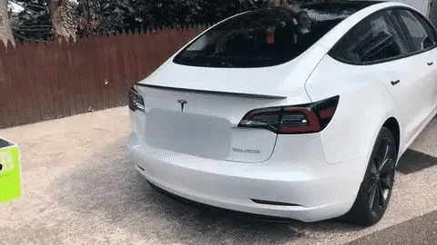 Autoease Foot Kick Sensor for Powered Tailgates installed on white Tesla with Fast Shipping Professional Installation Connected Car Experts