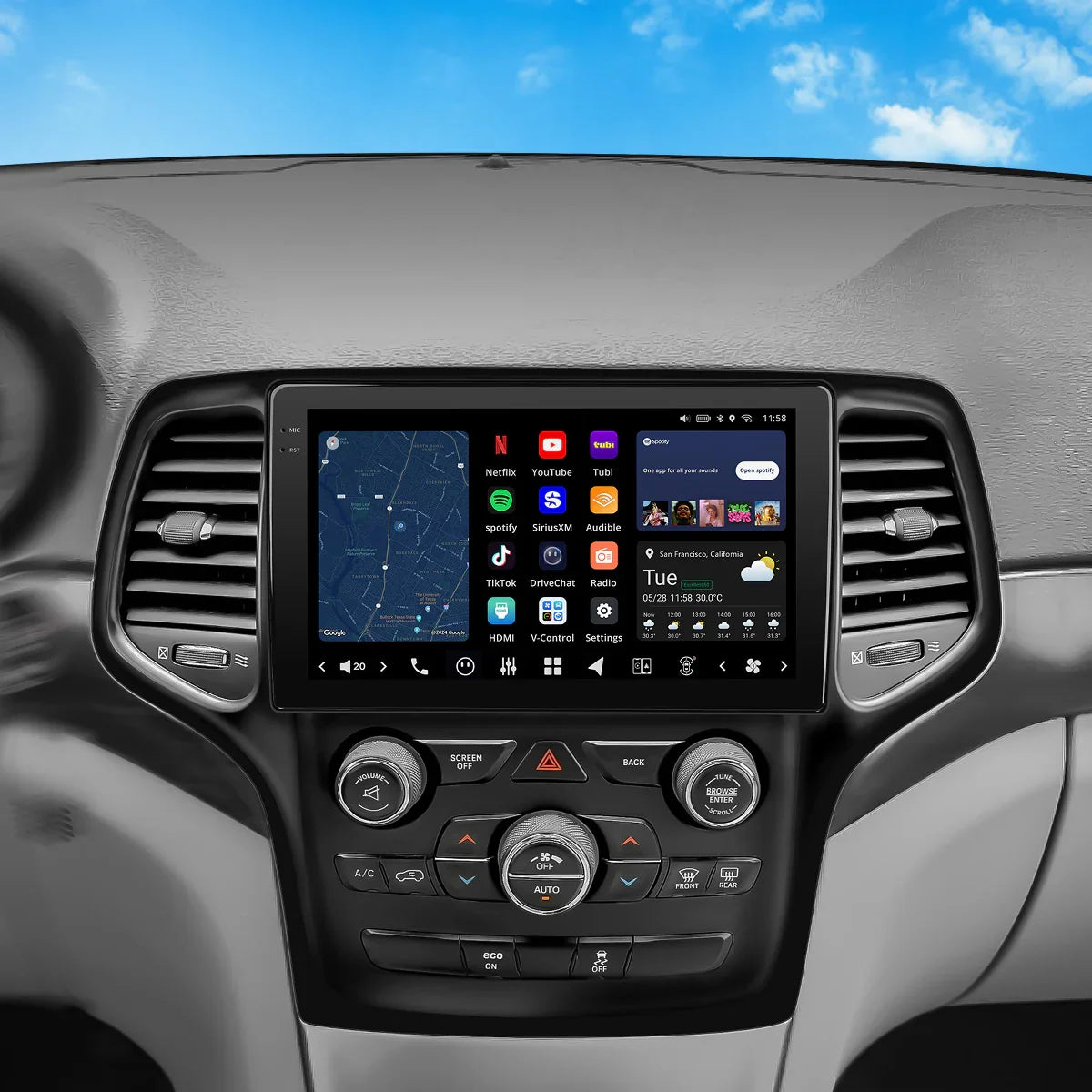 Car dashboard center console with touchscreen displaying navigation, apps, and climate controls beneath vents