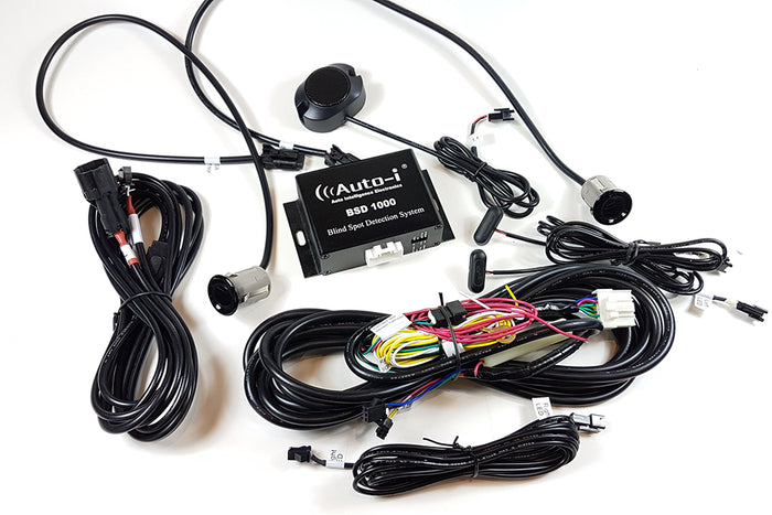 Auto-i BSD1000 Ultrasonic Blind Spot Detection Kit with wiring harnesses and sensors for professional installation and fast shipping.