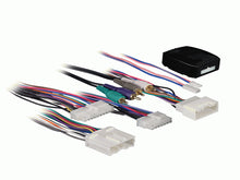 Axxess AXTO-MI2 Mitsubishi Rockford Fosgate Amplifier Interface with multicolor wiring harness for car audio installation.