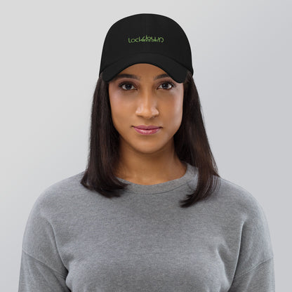 Woman wearing black Lockdown Security - Dad hat with green logo, promoting fast shipping and professional installation.
